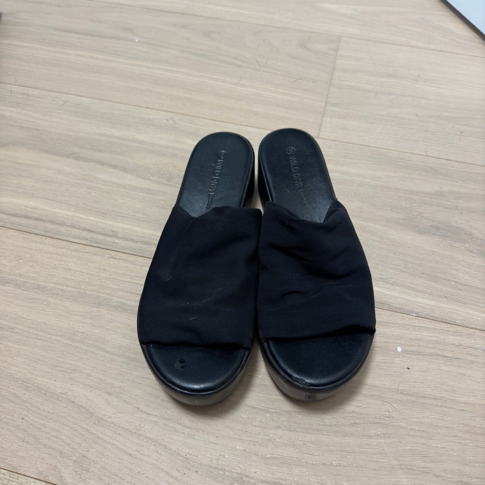 Black wedge heel slides